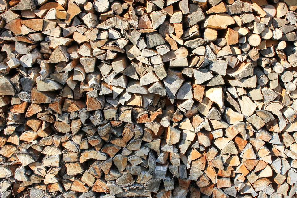 Brown and black firewood stacked