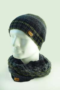 A merino wool hat and loop in different shades of green.